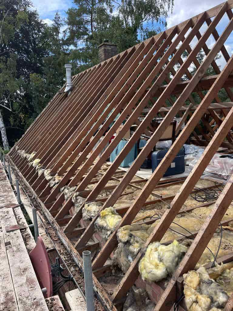 This is a photo of an old pitched roof which has been stripped and is just about to be re-roofed by Northampton Roofing Services