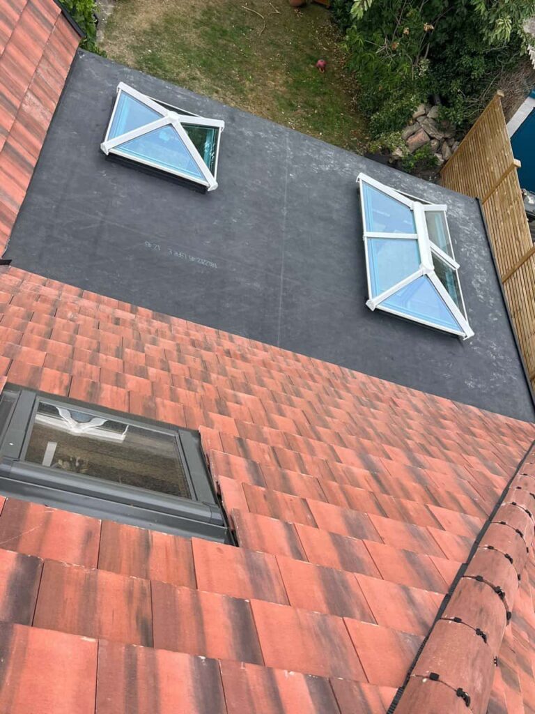 This is a photo of a newly constructed roof, with a combination of pitched and flat construction by Northampton Roofing Services